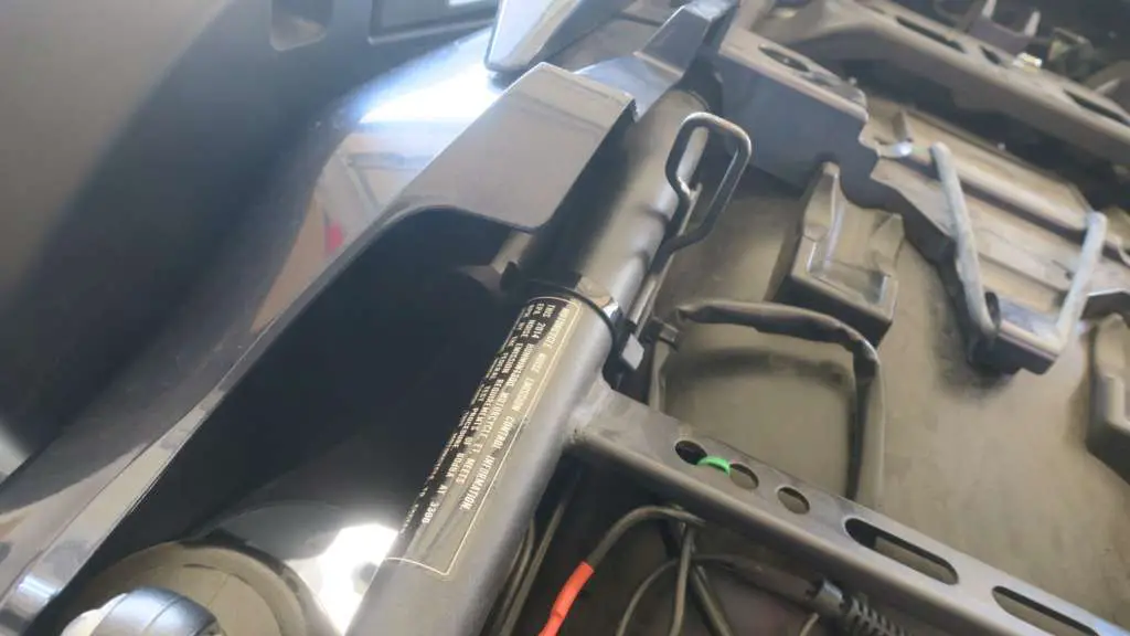 Pictured is the Monimoto transponder, barely visible in the area underneath the seat of a Honda CTX 1300.